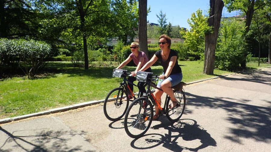 Madrid City Guided Bike/E-Bike Tour for Small Groups - Entering Madrid Fast from Plaza de España