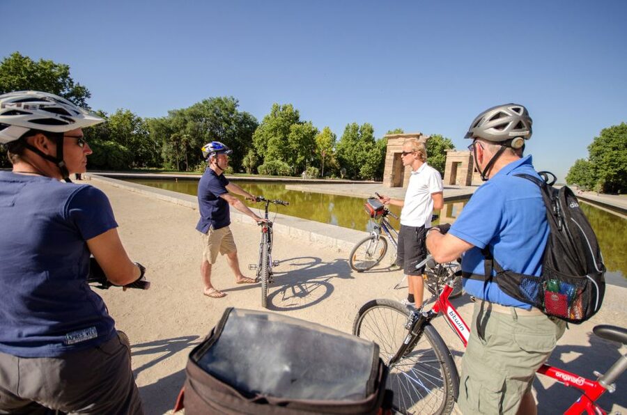 Madrid City Guided Bike/E-Bike Tour for Small Groups - Leaving the Park Through Alcalá Gate and Rejoining Real Madrid Streets