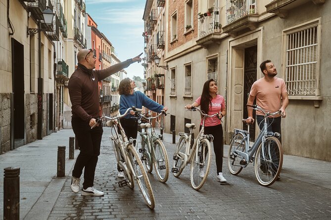 Madrid: City Highlights Guided Vintage Bike Tour - Los Jerónimos and the Gothic church story you can see in minutes