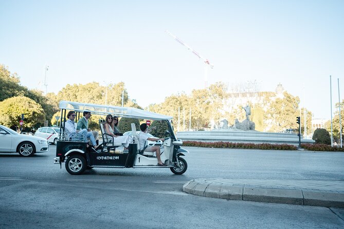 Madrid Express Tour with Local Guide in Eco Tuk Tuk Private - Mercado de San Miguel and the best kind of first impression: food, crowds, and style