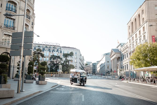Madrid Express Tour with Local Guide in Eco Tuk Tuk Private - Puerta de Alcalá: neoclassical grandeur and a fast, memorable landmark