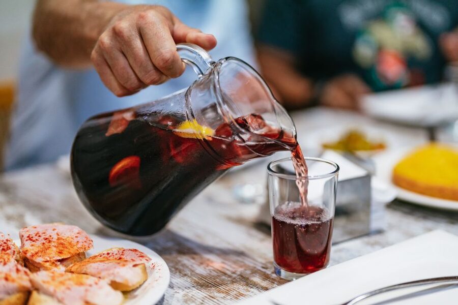 Madrid: Food & Wine Tour with 10 Tapas & 4 Drinks Included - Stop 1: Market-Style Cuisine Where Olive Oil and Seafood Do the Talking