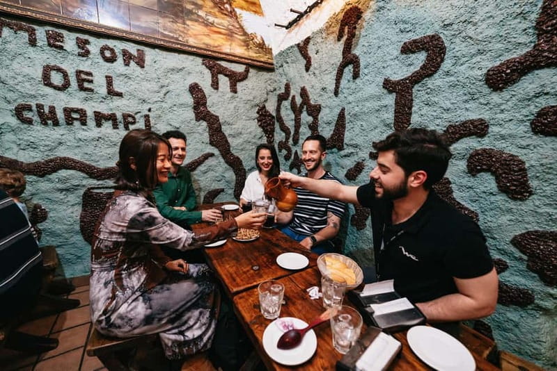 Madrid: Guided Tapas and Wine Tour with Rooftop Views - The Ham and Iberian Sausage Stop That Makes the Tour Feel Special