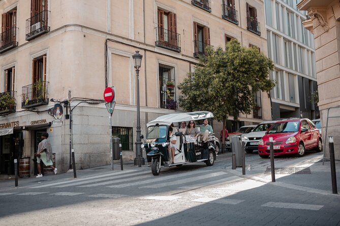Madrid Historical Tour with Local Guide in Eco Tuk Tuk Private - Palacio de las Cortes: Power, Columns, and Small Details That Matter