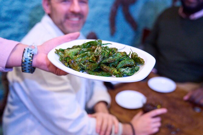 Madrid: Not Just Another Tapas & Wine Tour by Eating Europe - Stops 6 to 7: Puerta del Sol, Plaza Mayor, and the big-city stage