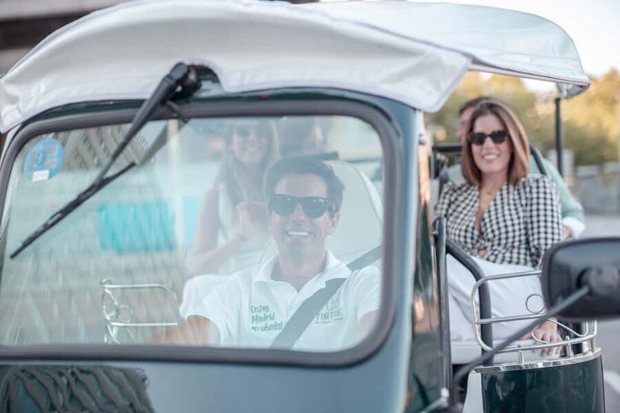 Madrid: Private City Tour by Eco Tuk Tuk - Royal Palace exteriors: the best kind of preview