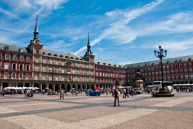 Madrid Sightseeing Tour with Royal Palace Skip the Line Ticket - Meeting at Julià Travel Madrid and How the Day Flows