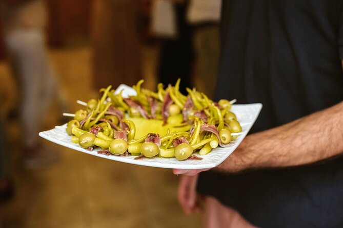 Madrid Tapas & Paella Cooking Experience with Local Market Visit - The guides: humor, stories, and techniques you can reuse at home