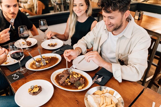 Madrid Tapas & Wine Tour with Rooftop Views and Local Guide - Stop 2: Plaza Mayor and a Ham and Sausage Tasting With Wine Pairing