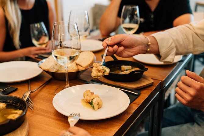 Madrid Tapas & Wine Tour with Rooftop Views and Local Guide - Stop 4: Barrio de las Letras for Shrimp With Garlic in a Terracotta Dish