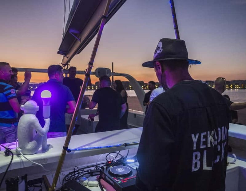 Malaga: Catamaran Sunset or Night Cruise w/ Live DJ & Drink - Sunset to night: how the cava and DJ music shape the mood