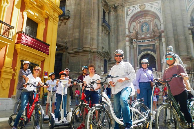 Malaga Electric Bikes Guided Tour - The port finale: lighthouse, Muelle Uno, and Palmeral de las Sorpresas