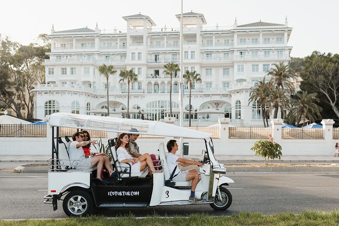 Malaga Expert Tour with Local Guide in Eco Tuk Tuk Private - The port of Malaga and La Farola lighthouse: the sea-facing story