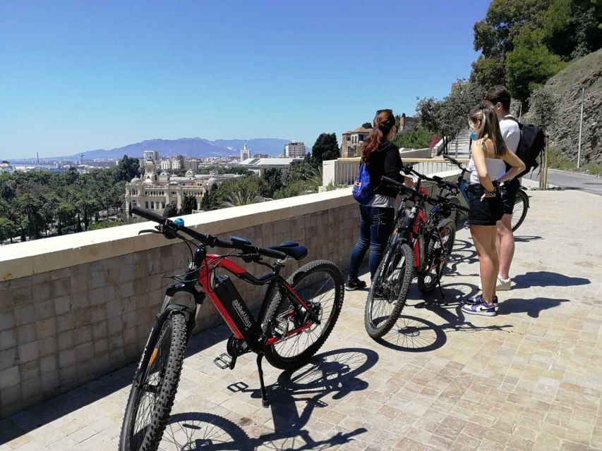 Malaga: Guided E-Bike Tour - Port highlights: lighthouse, Muelle Uno, and Palmeral de las Sorpresas