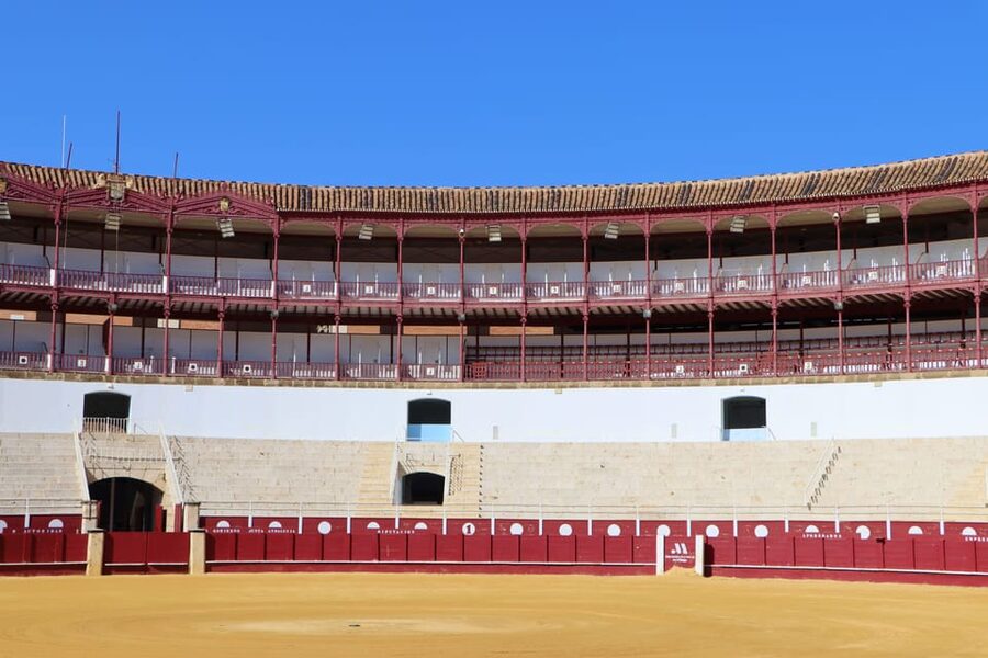 Malaga: Tour of Malagueta Bullring & Immersive Exhibition - Gate of Triumph, chapel, infirmary, and the hidden routes of the arena