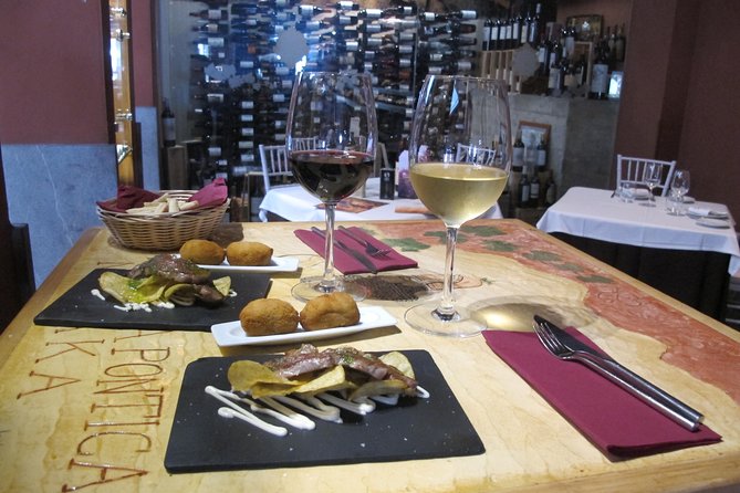Malaga Wine & Tapas Small Group Guided Tour - Alcazaba Area Finale: Modern Twists Like Gazpachuelo and Arroz con Chistorras