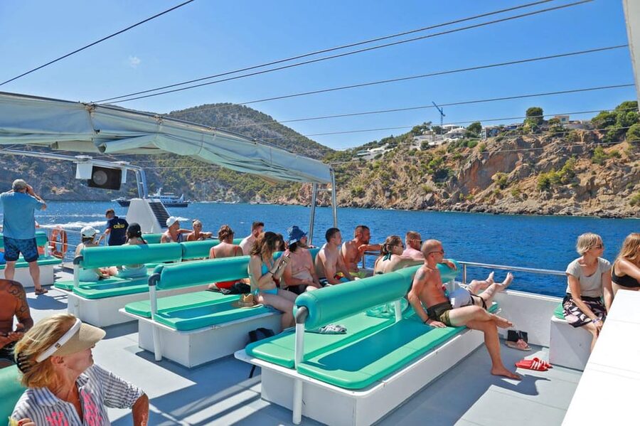 Mallorca: 2-Hour Coastline & Malgrat Islands Catamaran Tour - Deck comfort, music, and onboard food: the good and the crowded