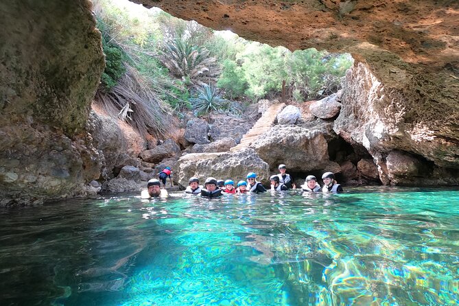Mallorca: Kayaking, Sea Cave, Cliff Jumping & Snorkel Tour - Snorkeling for treasure in clear Mediterranean water