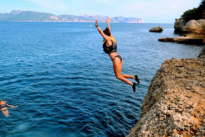 Mallorca: Kayaking, Sea Cave, Cliff Jumping & Snorkel Tour - Photos, picnic, and how the day wraps up