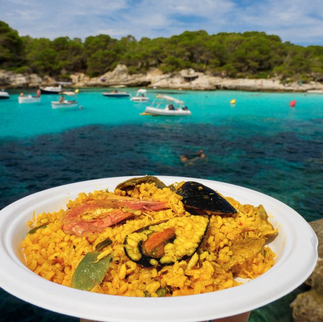 Menorca: Full-Day Boat Tour with Paella Lunch - Cala en Turqueta: the best chance to actually swim and relax