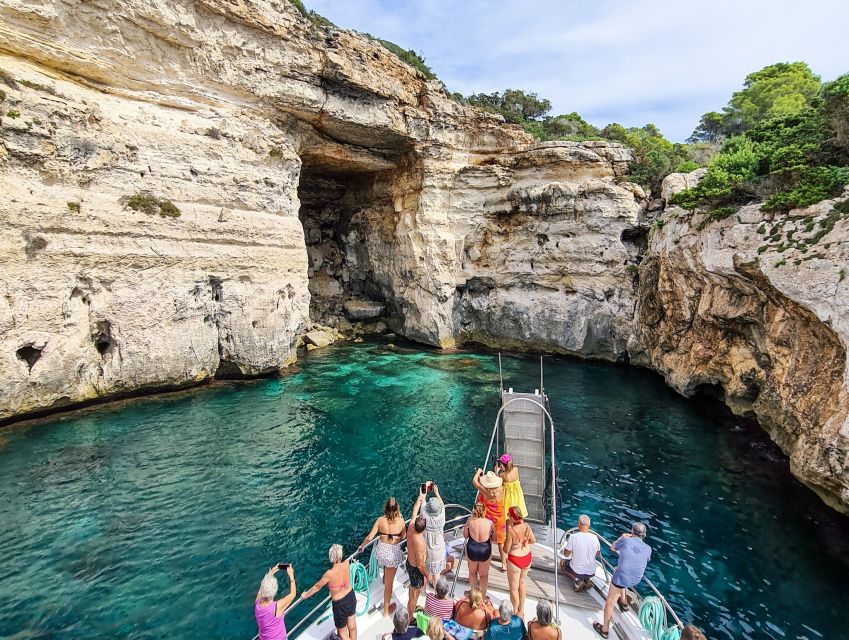 Menorca: Full-Day Boat Tour with Paella Lunch - The boat, crew, and onboard vibe