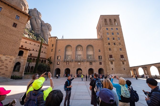Montserrat Half Day with Cable Car and Easy Hike from Barcelona - Inside the Monastery: Basilica, Atrium, and the Chapels Feel