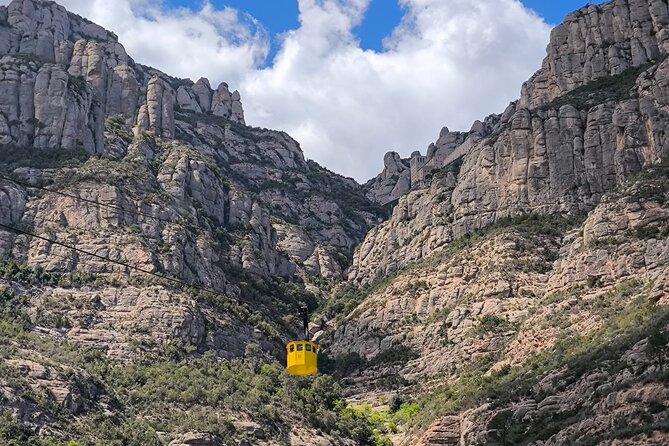 Montserrat Tour by Train with Cable Car and Cogwheel - 2.5 Hours of Free Time on Montserrat Mountains