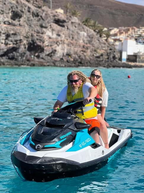 Morro Jable: Guided Jet Ski Safari (without license) - Morro Jable Lighthouse stop: the 5-minute swim and snorkeling break