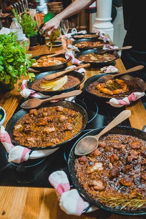 Paella Experience and Bottomless Wine in Barcelona - Unlimited Catalan wine, toast culture, and the party factor