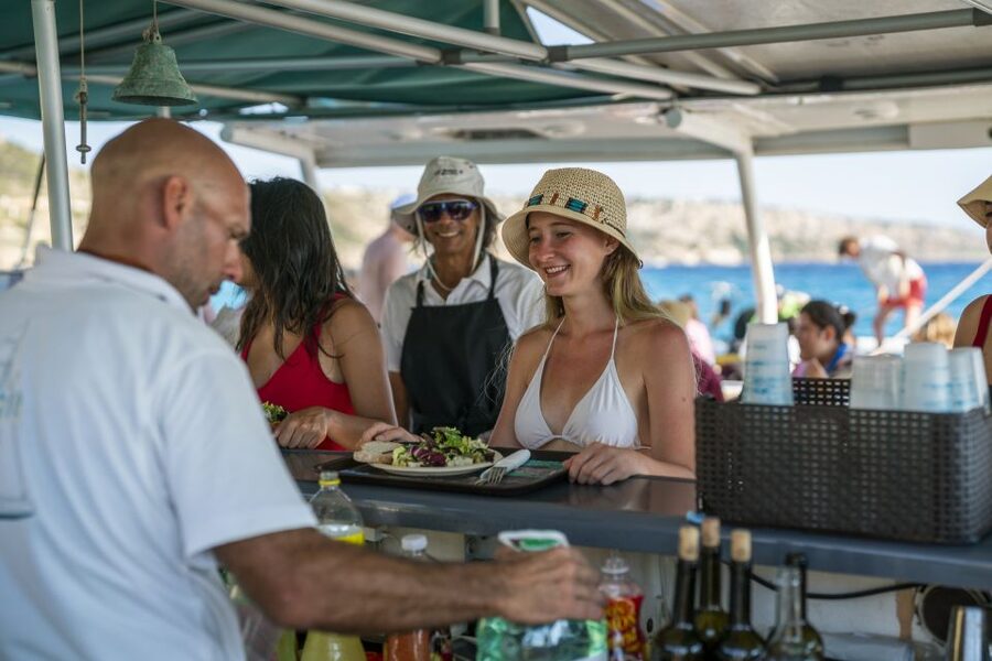 Palma de Mallorca: 5-Hour Catamaran Cruise with Lunch & Swim - Drinks, Music, and the Social Energy on a Catamaran