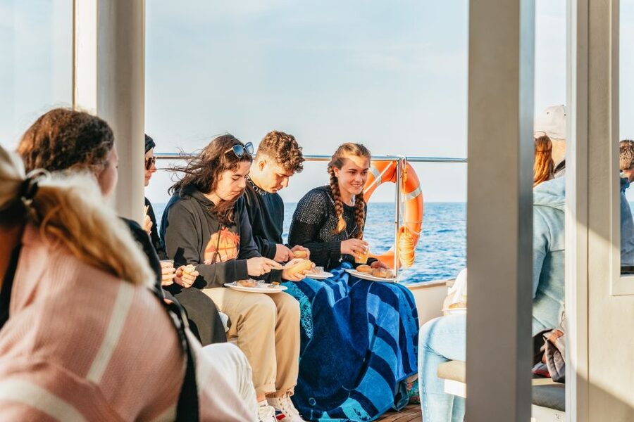 Port d'Alcudia: Sunrise at Sea & Dolphin Watching Boat Tour - What the on-board breakfast is like, and why it fits the morning