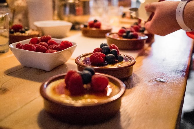 Premium Paella Cooking Class & 10 Spanish Tapas - Wine, pacing, and how interactive it feels
