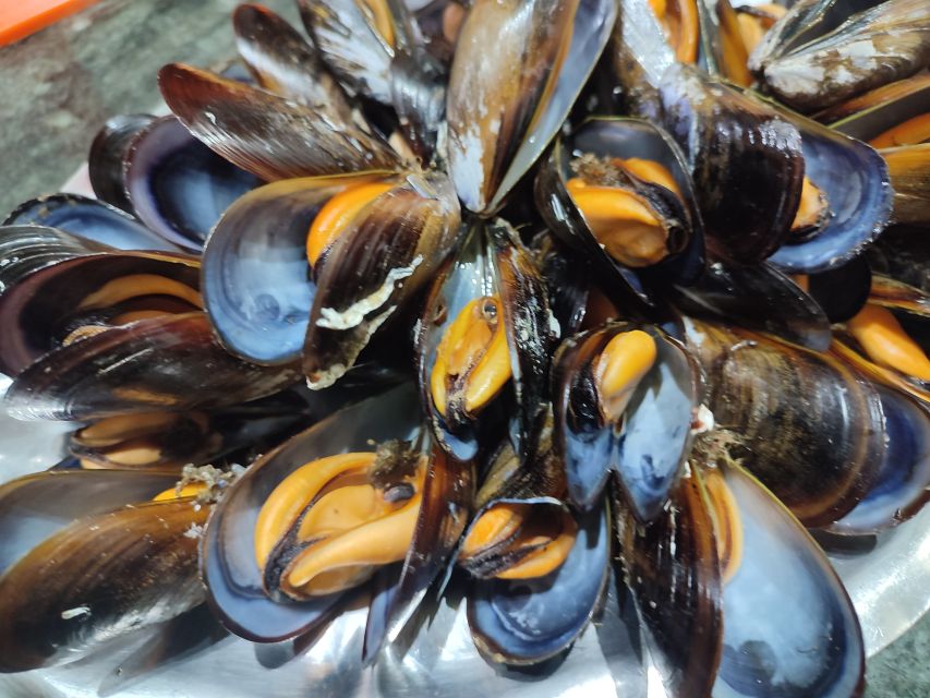 Ría de Arousa: Boat Ride to Mussel Farm with Tasting - Getting to Port of O Grove, and why timing matters for deck seats