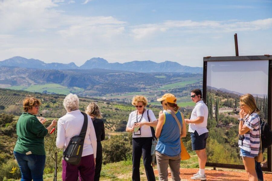 Ronda: LA Almazara LA Organic, Olive Oil Museum and Tasting - Walking the LA Organic Country House grounds: citrus, quince, and countryside views