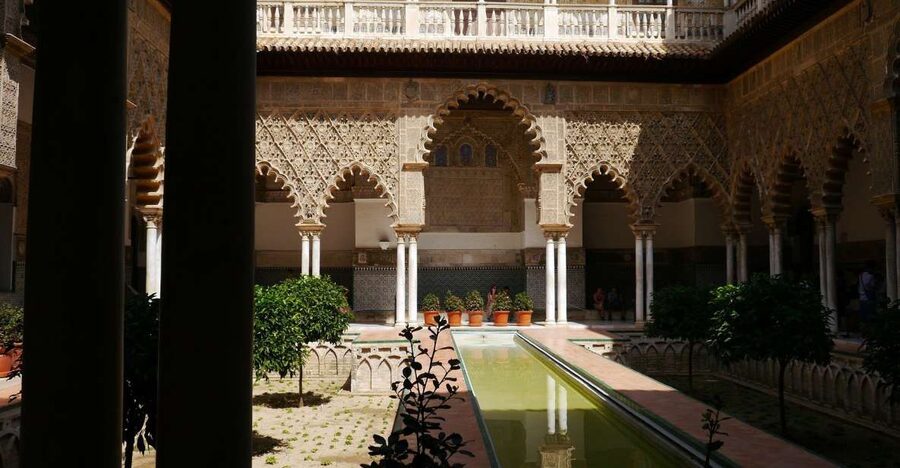 Royal Alcázar of Seville Skip-the-Line Guided Tour - Main Palace Highlights: Mudejar, Gothic, and Stucco Courtyard
