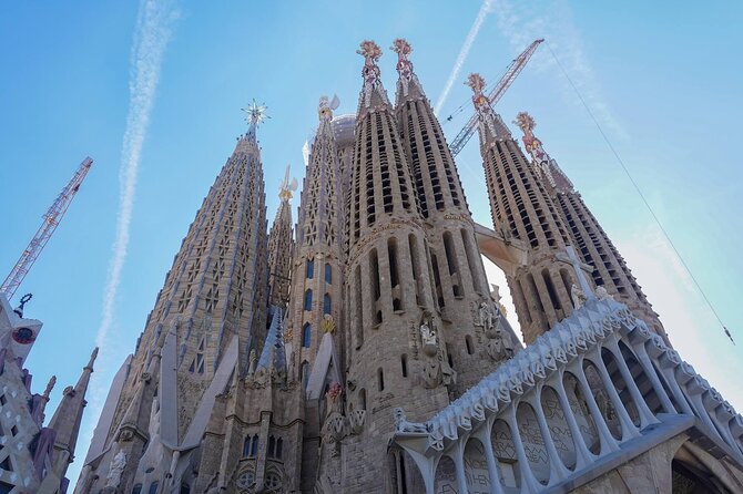 Sagrada Familia & Park Guell Guided Tour with Skip The Line - Headsets, guide variety, and why group tours can feel good