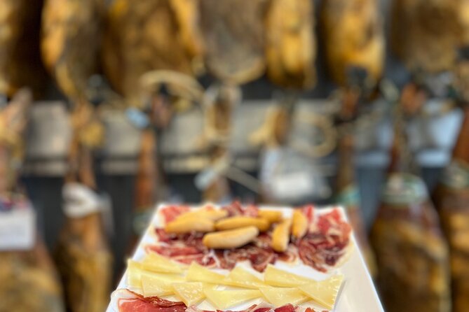 San Sebastian Pintxo Food, Wine & Market Foodie Tour(Small Group) - Dessert stop at a classic 60th anniversary bar and Basque licor
