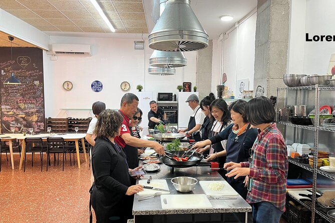 Seafood paella cooking class, tapas and visit to Ruzafa market. - Mercado de Ruzafa shopping, customs, and ingredient choices