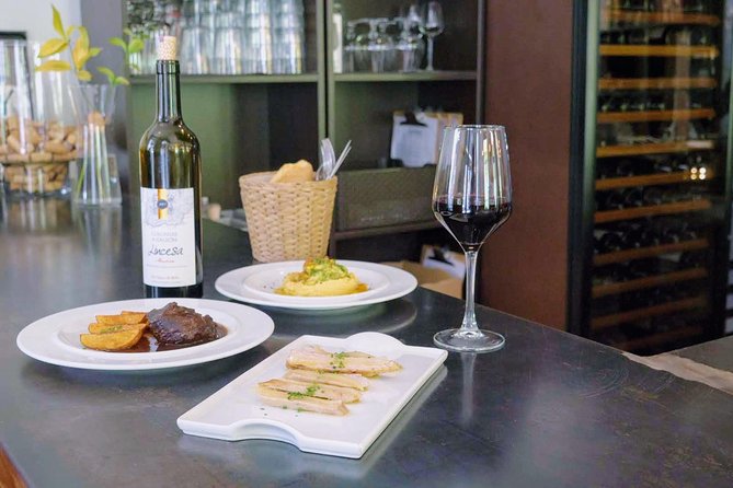 Sevilla Food Tour: Tapas, Wine, History & Traditions - Plaza del Pan: the traje de flamenca tradition break