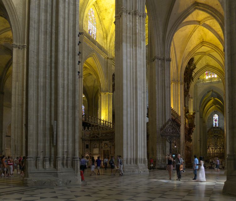 Seville Cathedral and Giralda Tower Guided Tour and Tickets - La Giralda Tower: 35 Ramps, Crowds, and the City Views That Make It Worth It