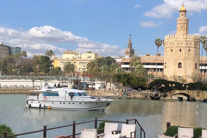 Seville: Cruise along the Guadalquivir River with appetizer - Your included aperitif: ham, Manchego, and one drink