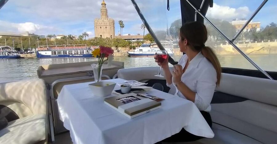 Seville: Exclusive River Boat Tour with Tapas - La Cartuja Island and Expo 1992: the tour starts with newer Seville
