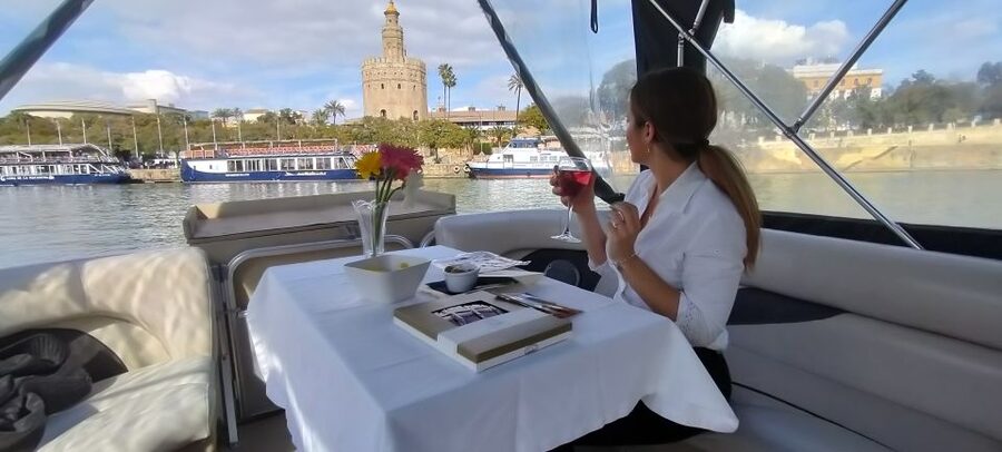 Seville: Exclusive River Boat Tour with Tapas - Triana Bridge, Isabel Bridge II, and the view of Seville’s river life