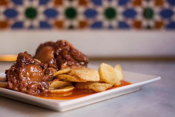 Seville Food Tour: Vermut, Churros & 10+ Tasty Local Dishes - Vermut, churros, ham, eggplant, anchovies, and more
