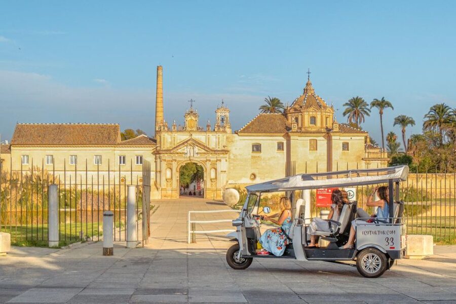 Seville: Private City Tour by Eco Tuk Tuk - Getting your bearings fast: Puente de Isabel II and the Triana river vibe
