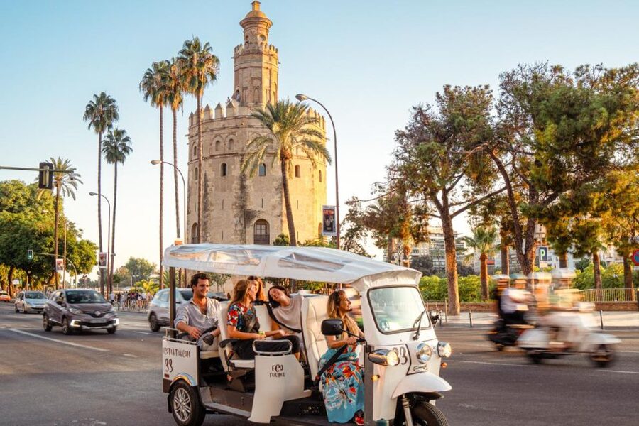 Seville: Private City Tour by Eco Tuk Tuk - María Luisa Park and the Guadalquivir River: where the ride turns scenic