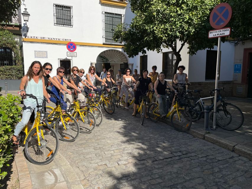 Seville: Relaxing City Bike Tour with a Tour Guide - Along the Guadalquivir to Torre del Oro: open-air city views