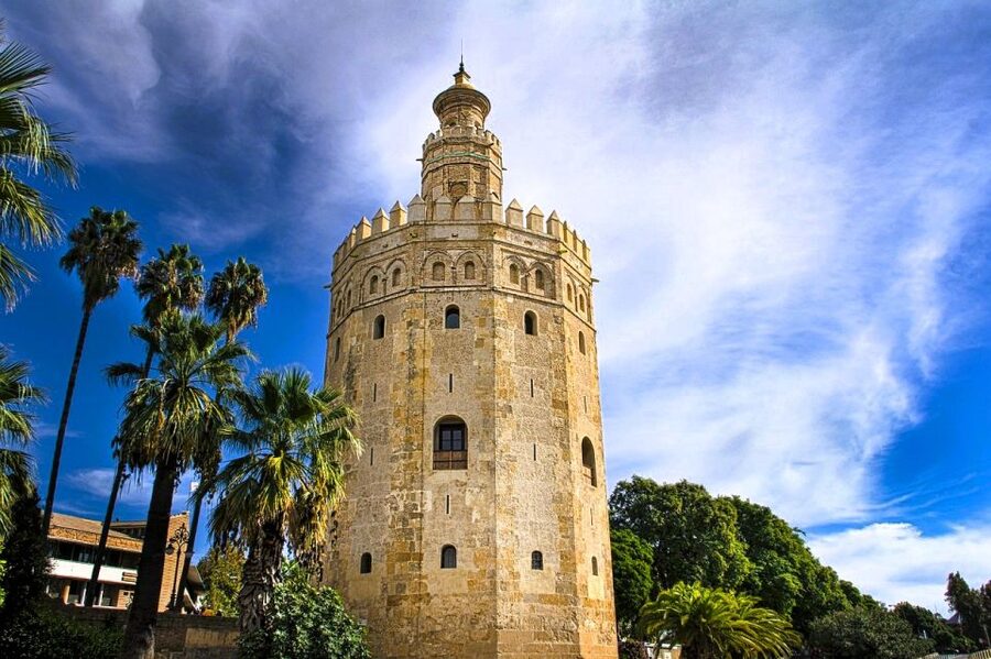 Seville: Small-Group City Highlights Walking Tour - Alcázar exterior: a power palace you can read from the street