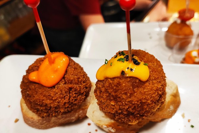 Spanish Wine and Tapas Tour in a Local Neighborhood in Barcelona - Wine and tapas pairing, Spanish-style