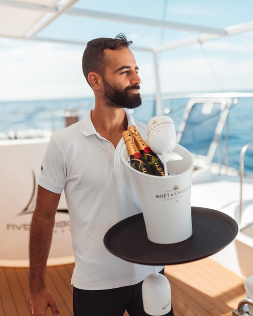 Tenerife: Catamaran Cruise with Brunch and Unlimited Drinks - Coastline Passes: Las Galletas, Los Cristianos Cliffs, and Photo Stops
